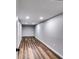Hallway with recessed lighting and hard wood flooring at 516 Jordan Nw Dr, Tucker, GA 30084