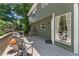Inviting back deck with comfortable seating, ideal for enjoying the serene outdoor view and fresh air at 1520 Dorchester Dr, Lawrenceville, GA 30043
