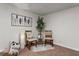 Cozy basement corner with stylish seating area, decorative pillows, and accent lighting for a relaxing retreat at 1520 Dorchester Dr, Lawrenceville, GA 30043