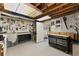 Workshop area with organized pegboards, tools, and workbench, perfect for DIY projects and hobbies at 1520 Dorchester Dr, Lawrenceville, GA 30043