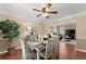 Charming dining room with hardwood floors and adjacent living space at 1520 Dorchester Dr, Lawrenceville, GA 30043
