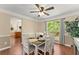Bright dining room with hardwood floors and views of the backyard at 1520 Dorchester Dr, Lawrenceville, GA 30043