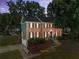 Stately two-story brick home with manicured landscaping and a welcoming front entrance, perfect for curb appeal at 1520 Dorchester Dr, Lawrenceville, GA 30043
