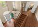 Second floor foyer view with staircase, chandelier, and hardwood floors at 1520 Dorchester Dr, Lawrenceville, GA 30043