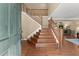 Inviting foyer with hardwood floors and staircase leading to the upper level at 1520 Dorchester Dr, Lawrenceville, GA 30043