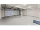 Spacious three-car garage with sealed concrete floor and ample room for vehicles and storage at 1520 Dorchester Dr, Lawrenceville, GA 30043