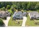 Stunning home with pristine landscaping, long driveway, and mature tree coverage at 4875 Churchill Ridge Dr, Cumming, GA 30028