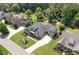 Beautiful home with professionally landscaped yard, long driveway, and mature tree coverage at 4875 Churchill Ridge Dr, Cumming, GA 30028