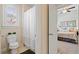 Full bath with tiled floor, shower with curtain, and next to bedroom at 4875 Churchill Ridge Dr, Cumming, GA 30028