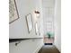 Stylish staircase featuring modern lighting fixtures and tasteful decor at 4875 Churchill Ridge Dr, Cumming, GA 30028