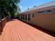 Large wooden deck offering ample space for outdoor relaxation and entertainment at 5022 Anclote Dr, Alpharetta, GA 30022
