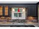 Close up of the kitchen sink with grey cabinets, grey backsplash and a granite countertop at 5022 Anclote Dr, Alpharetta, GA 30022