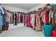 Large walk-in closet with ample storage space and organization at 5545 Adirondack Dr, Cumming, GA 30040