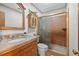 Bathroom featuring a vanity, sink, and shower, offering a clean and functional space at 686 Hillwood Ct, Dacula, GA 30019