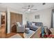 Cozy bedroom with hardwood floors, closet, and comfortable seating, creating a relaxing space at 686 Hillwood Ct, Dacula, GA 30019