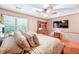 Well-lit bedroom showcasing warm colors, decor, and natural light at 686 Hillwood Ct, Dacula, GA 30019