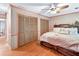 Comfortable bedroom featuring multiple closets and natural lighting at 686 Hillwood Ct, Dacula, GA 30019