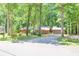Ranch home with a long driveway and attached two-car garage at 686 Hillwood Ct, Dacula, GA 30019