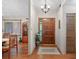 Welcoming foyer with a decorative rug, wood flooring, and a stylish chandelier at 686 Hillwood Ct, Dacula, GA 30019