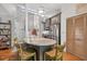 A well-lit kitchen with an island that offers seating and is equipped with stainless steel appliances at 686 Hillwood Ct, Dacula, GA 30019