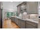 Bright kitchen featuring sleek appliances, ample counter space, and a scenic view at 686 Hillwood Ct, Dacula, GA 30019