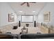 Spacious theater room with screen, speakers, and comfortable seating area for an immersive viewing experience at 686 Hillwood Ct, Dacula, GA 30019