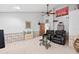 Well-appointed theater room featuring comfortable seating, and a large screen for an amazing experience at 686 Hillwood Ct, Dacula, GA 30019
