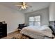 Bedroom with wood floor, ceiling fan and natural light at 1668 Legrand Cir, Lawrenceville, GA 30043