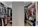 Walk-in closet with clothing racks and shelving at 1668 Legrand Cir, Lawrenceville, GA 30043