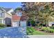 Charming two-story brick home with a well-maintained front yard and a two-car garage, perfect for Gathering living at 1668 Legrand Cir, Lawrenceville, GA 30043
