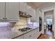 Granite counters, gas range, and stainless appliances make cooking a pleasure in this great kitchen at 1668 Legrand Cir, Lawrenceville, GA 30043