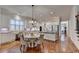 Charming kitchen features stainless appliances, granite countertops, and adjoining breakfast nook at 1668 Legrand Cir, Lawrenceville, GA 30043