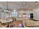 Elegant kitchen with granite countertops, stainless steel appliances, and a breakfast nook for casual dining at 1668 Legrand Cir, Lawrenceville, GA 30043