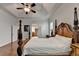 Spacious main bedroom features hardwood floors, tray ceiling, and bath access at 1668 Legrand Cir, Lawrenceville, GA 30043