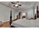 Spacious main bedroom features hardwood floors, tray ceiling, and bath access at 1668 Legrand Cir, Lawrenceville, GA 30043