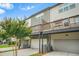 Townhome with garages on the first level and outdoor patios on the second level at 3641 Princeton Ave, Atlanta, GA 30337