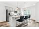 Modern kitchen with stainless steel appliances, granite countertops, and bar seating at the island at 3641 Princeton Ave, Atlanta, GA 30337