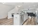 Kitchen featuring stainless steel appliances, an island with bar seating, and sleek design at 3641 Princeton Ave, Atlanta, GA 30337
