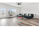 Bright living room with comfortable seating, stylish decor, and access to a patio area at 3641 Princeton Ave, Atlanta, GA 30337