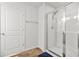 Modern bathroom shower with glass door and chrome fixtures and a tile surround at 3641 Princeton Ave, Atlanta, GA 30337
