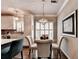 Bright kitchen featuring stainless steel appliances, white cabinets, and modern lighting at 510 Elgaen Ct, Roswell, GA 30075