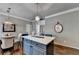 Spacious kitchen with stainless steel appliances, a center island, and hardwood floors at 510 Elgaen Ct, Roswell, GA 30075