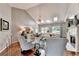 Bright living room with hardwood floors, high ceilings, fireplace, and comfortable seating at 510 Elgaen Ct, Roswell, GA 30075
