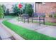 A well-maintained community area with benches and landscaping, perfect for relaxing and enjoying the outdoors at 5504 Cameron Parc Dr, Alpharetta, GA 30022