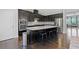 Kitchen with granite countertops, stainless steel appliances, and a central island with seating at 5504 Cameron Parc Dr, Alpharetta, GA 30022