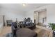 Cozy living room with comfortable sofa, stylish decor, and staircase at 5504 Cameron Parc Dr, Alpharetta, GA 30022