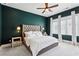 Bedroom showcasing a tufted headboard and lots of natural light at 704 Banton Nw Dr, Atlanta, GA 30318