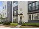 Beautiful townhome with manicured landscaping and striking architectural details at 704 Banton Nw Dr, Atlanta, GA 30318