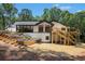 Beautiful backyard with deck and stair access at 9025 Huntcliff Trce, Atlanta, GA 30350