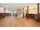 Finished basement features wood paneled walls, staircase, and bar area at 9025 Huntcliff Trce, Atlanta, GA 30350